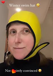 Three swim caps are always better then one.