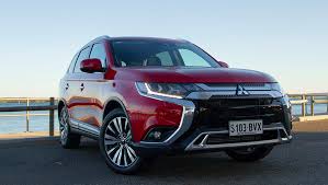 The outlander sport's exterior features a dark front fascia, wide grille, and large wheel arches. Mitsubishi Outlander 2019 Review Carsguide