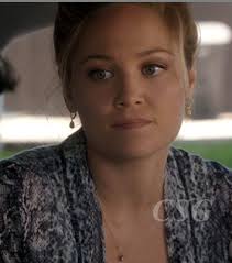 Parenthood Fashion Julia's green pleated v-neck dress