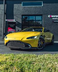 Image result for Yellow Tang 2021 Aston Martin