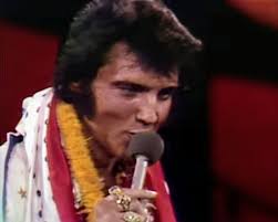 How wonderful this photo of Elvis devoted to his neighborhood and his fans.  The facial expressions mean that he loves us and wants to convey his songs  with all of himself, regardless