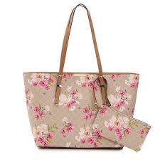 Founded in 2009 by kelly moore, our products are. Kelly Katie Bags Kelly Katie Tan With Floral Tote Bag With Pouch Poshmark