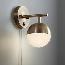 This clean, polished wall sconce is stunning in its minimalism. Plug In Wall Lights Lamps Plus