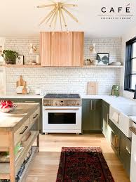 We Are Loving The Mix Of Matte White Cafe Appliances With Open Shelving Subway Tile Backspl Green Kitchen Backsplash Kitchen Renovation Green Kitchen Cabinets