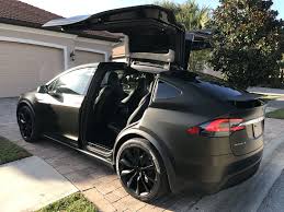 We have 350 tesla suvs for sale that are reported mileage: Tesla Model X Black Satin Gold Dust Vinyl Wrap With Carbon Fiber Accents On Chrome And All 6 Seat Backs Awesome Post Tesla Model X Tesla Model Dream Cars