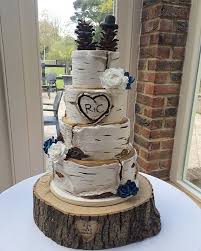 Rustic Birch Tree Wedding Cake A Rustic Birch Log Wedding Cake 4 Tiers Featured Including Sugar Flowers And Handmade Pine Cone Cake Top Cake Topper Wedding Romantic Cake Wedding Cake Rustic