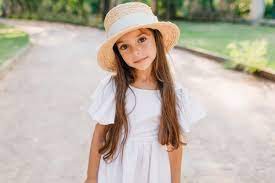 Little brown haired girls by frankie rose and the outs. Premium Photo Lovely Brown Haired Girl With Long Hair In Black Dress Is Standing In Yellow Field Concept Of Summer Youth Freedom Place For Text