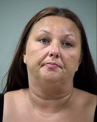 Cops: Woman had trove of stolen IDs