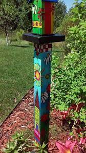 This is the way i used to make wooden peace poles before i switched to stone and metal. 39 Trendy Yard Art Totems Peace Pole Art Pole Garden Poles Garden Totems