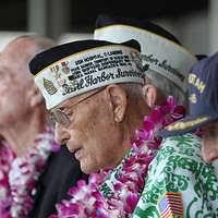 U.S. Marine Corps Sgt. Harold Wadley (retired), salutes