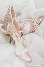Maybe you would like to learn more about one of these? A Soft White Styled Shoot With Angelic Accents Wedluxe Media Wedding Shoes Bridal Shoes Fancy Shoes