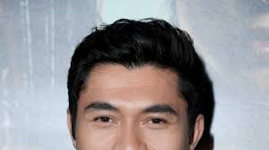 So what expectation is he going to shatter next? Henry Golding Styles His Mom S Hair For Crazy Rich Asians Movie Premiere Teen Vogue