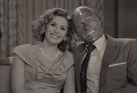 What kind of item is her pin outside westview? Damn Good Coffee And Hot First Wandavision Trailer Debuts During 2020 Emmy Awards