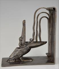 Maybe you would like to learn more about one of these? Pair Art Deco Wrought Iron Pelican Bookends Edgar Brandt France 1924