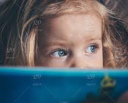 Or blonde hair and brown eyes. Child Girl Blonde Playing In The Tablet Blue Eyes Stock Photo 8cd620c3 D229 4a30 94e9 2a6ca91b0f3a