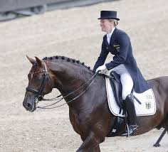 Helen Sichert Das Gold Fur Deutschland St Georg Dressurpferde Pferd Und Reiter Pferdeliebe
