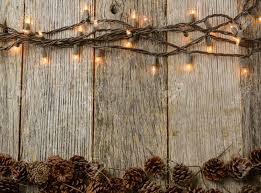 Christmas Lights And Pine Cones On Rustic Wood Background Rustic Background Wood Background Rustic Wood Background