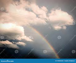 Nuvens lindos do arco-íris foto de stock. Imagem de lindo