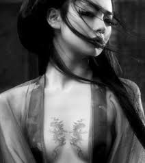 Some of these tattoos include names, cartoon characters, flowers, animals, or inspirational quotes. 10 Best Breast Tattoo Designs