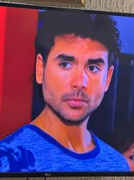 Emily the Strange aims her slingshot at Salvador Mendoza.