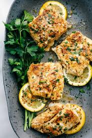Baked Cajun Garlic Butter Cod Is A Tender And Juicy Cod Filet Baked In A Buttery Cajun Seasoning With Garli Cod Fish Recipes Baked Fish Recipes Baked Baked Cod