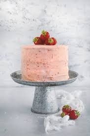 Birthday cake decorated with happy birthday candles. Pink Strawberry Cupcakes 3 Layered Strawberry Cake Family Spice