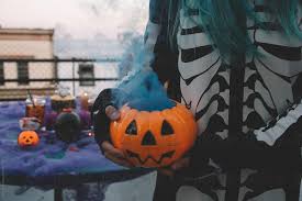4.6 out of 5 stars. Person In A Halloween Costume Holding Scary Pumpkin Decor By Mosuno Halloween Pumpkin