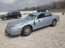 Image result for Light Ice Blue 2008 Town Car