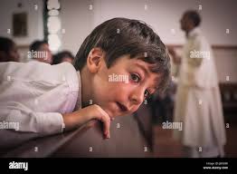 Girl in pew hi-res stock photography and images