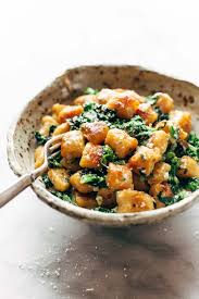 Sweet Potato Gnocchi With Broccoli Rabe And Garlic Sage Butter Sauce Pinch Of Yum Recipe Sweet Potato Gnocchi Vegetarian Recipes Recipes