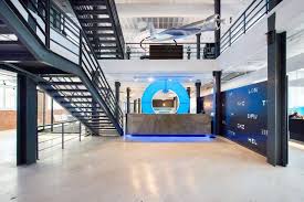 Inhouse Highlights Travelstart S Brand Identity In Cape Town Headquarters Design Design Furniture Visual Merchandising