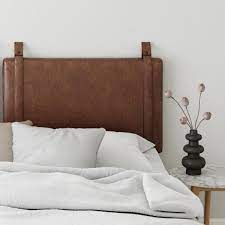 Arched headboard featuring horizonal planks and solid wood posts. Nathan James Harlow 36 In Vintage Brown Pu Leather With Adjustable Straps And Black Metal Rail Twin Wall Mount Upholstered Headboard 94001 The Home Depot