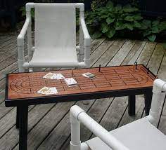 There's also a scoring row if you feel like being competitive. Cribbage Table Cribbage Board Red Chestnut Minwax With Black Etsy Cribbage Table Cribbage Board Cribbage Board Table