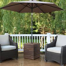 Diy playful patio umbrella revamp with long fringe and pretty painting (via www.designlovefest.com) Diy Umbrella Stand Side Table Video Plans Steps This Old House