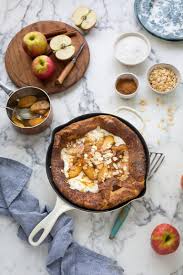 Dutch Baby Pancake With Caramelised Pink Lady Apples Cinnamon Recipe Apple Cinnamon Recipes Baby Pancakes Cinnamon Apples