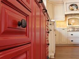 red kitchen cabinets with oil rubbed