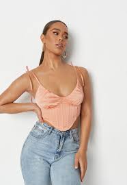 As low as $20.00 regular price $49.90. Peach Satin Ruched Bust Corset Top Missguided