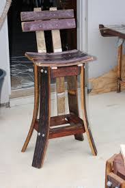 Maybe you would like to learn more about one of these? High Back Bar Stool Up Cycled Made From Red Wine Barrels Wood Etsy Barrel Decor Barrel Furniture Wine Barrel Furniture