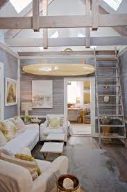 Beach theme decor is all about bringing the beach into your home and that includes color and texture. 40 Chic Beach House Interior Design Ideas Loombrand Beach House Living Room Beach House Interior Beach House Interior Design