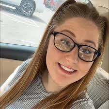 What are some restaurants with nice outdoor dining areas for a group of  10-15 ladies?