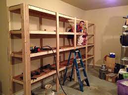 I'd go wider (6') so that you can fit three of those giant storage totes per shelf. Garage Shelving Plans Decor Ideasdecor Ideas Garage Shelving Plans Garage Storage Shelves Building Shelves