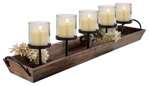 Wrought iron hurricane candle holders can offer both excellent functionality and aesthetic appeal. 27 5 Rustic Wood Centerpiece Tray With Five Metal Candle Holders 6 Piece Set Beach Style Candleholders By Pier Surplus Houzz