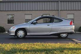 honda insight side profile silver manual first generation 5 speed thule roof rail honda insight honda toyota hybrid