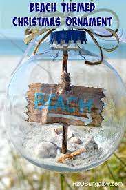 Hang seashells on pieces of driftwood. Diy Beach Themed Christmas Ornament