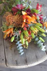 Sweater Season Is In The Air With Our Autumn In Aspen Bouquet Full Of Farm Fresh Orange Lilies Orange Spray Roses Blumenstrauss Hochzeit Blumenstrauss Lilien