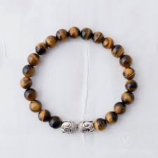 Check spelling or type a new query. Blessed Tiger Eye Buddha Bracelet