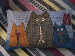 tambien estarian bien estas aplicaciones en un delantal cojines gatos almohadones