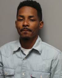 Man charged in Ballpark Village killing, but he's still