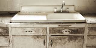 Push the glide with the screwdriver head in the slot. How To Fix Old Cabinets And Drawers