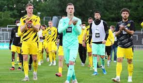 It is best known for its men's professional football team , which plays in the bundesliga , the top tier of the german football league system. Hty6d3ixj4fdhm
